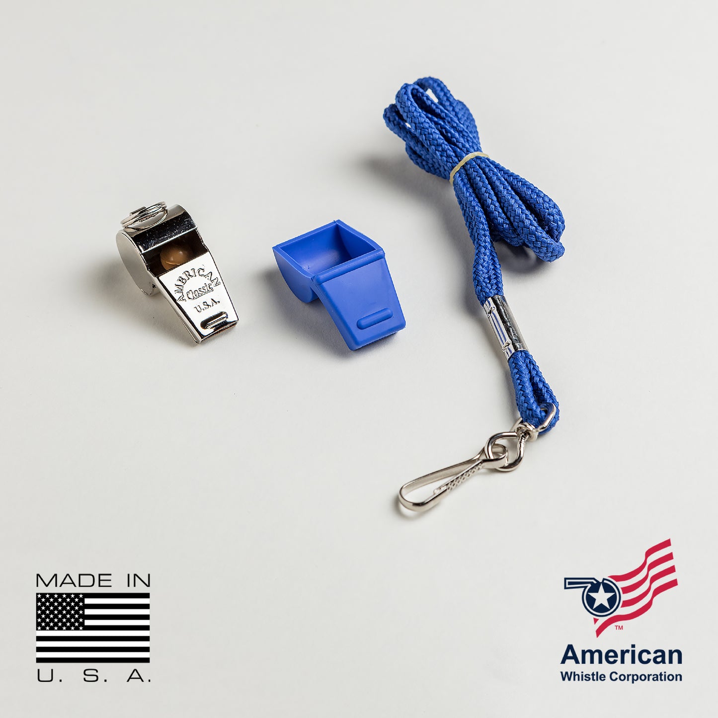 Polished American Classic Brass Whistle with lanyard, made in the USA – ideal for police, coaches, and safety professionals